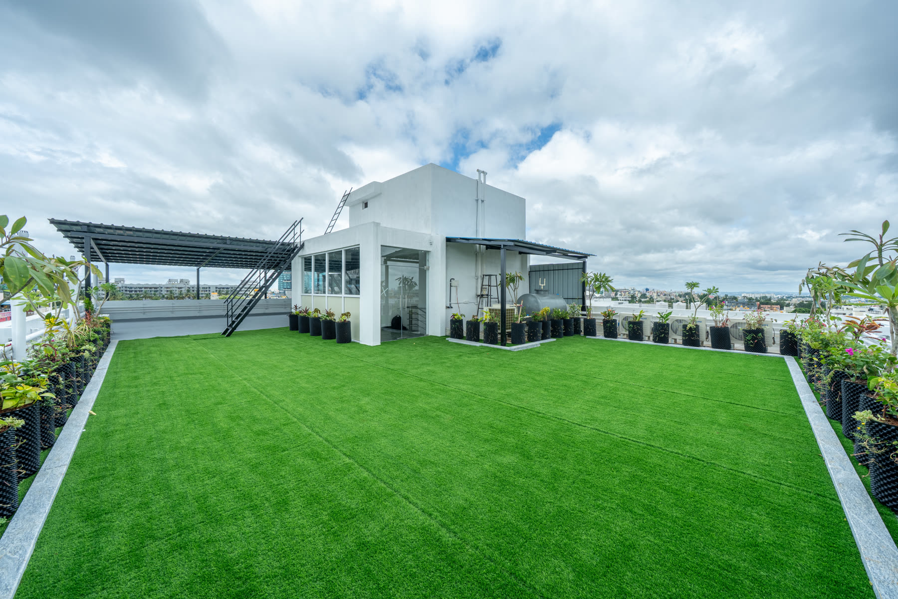 Rooftop sky garden with landscaped green space and panoramic views